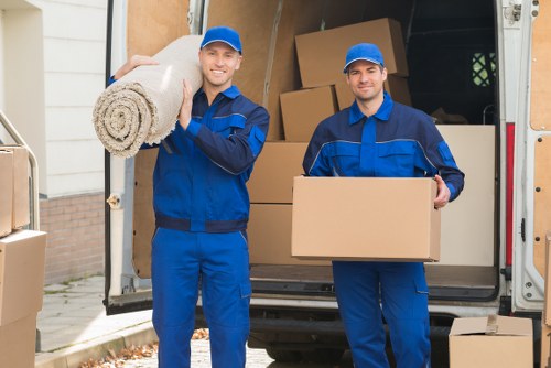 Packed boxes and moving supplies used by packing services in Mileend