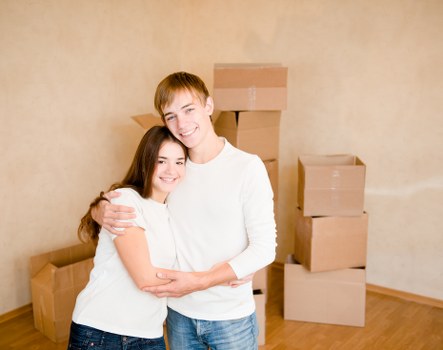 Organized storage unit in Mileend with packed boxes and furniture