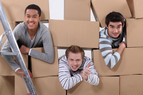 Careful handling of fragile belongings during packing services in Mileend