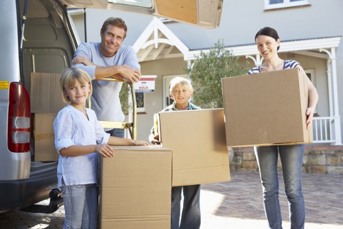 Team organizing boxes during a smooth removals job in Mile End