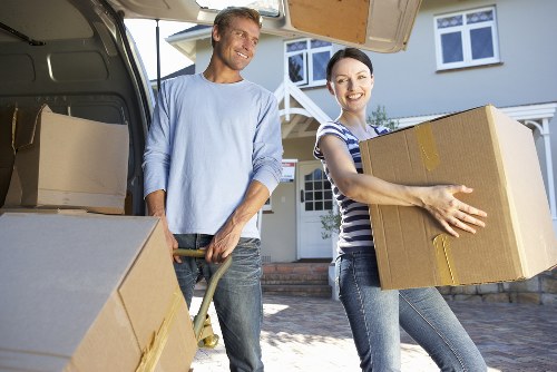 Moving day loading furniture during house removals in Mileend